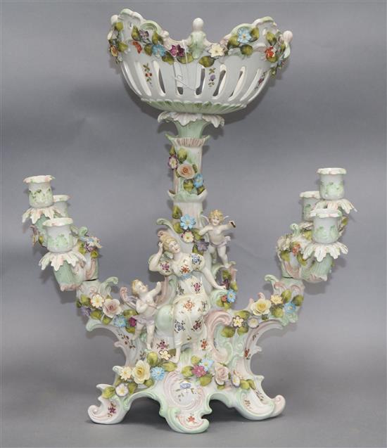 A German floral and putti encrusted centrepiece height 48.5cm